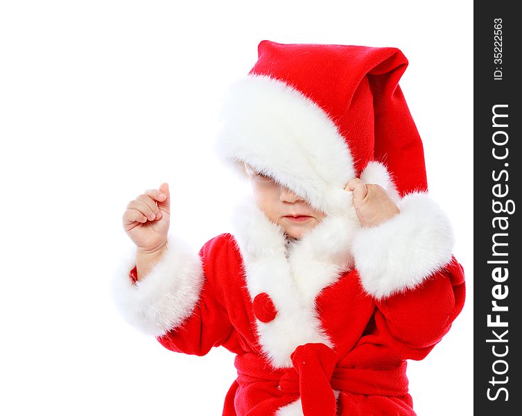 Little girl dressed in Santa Claus