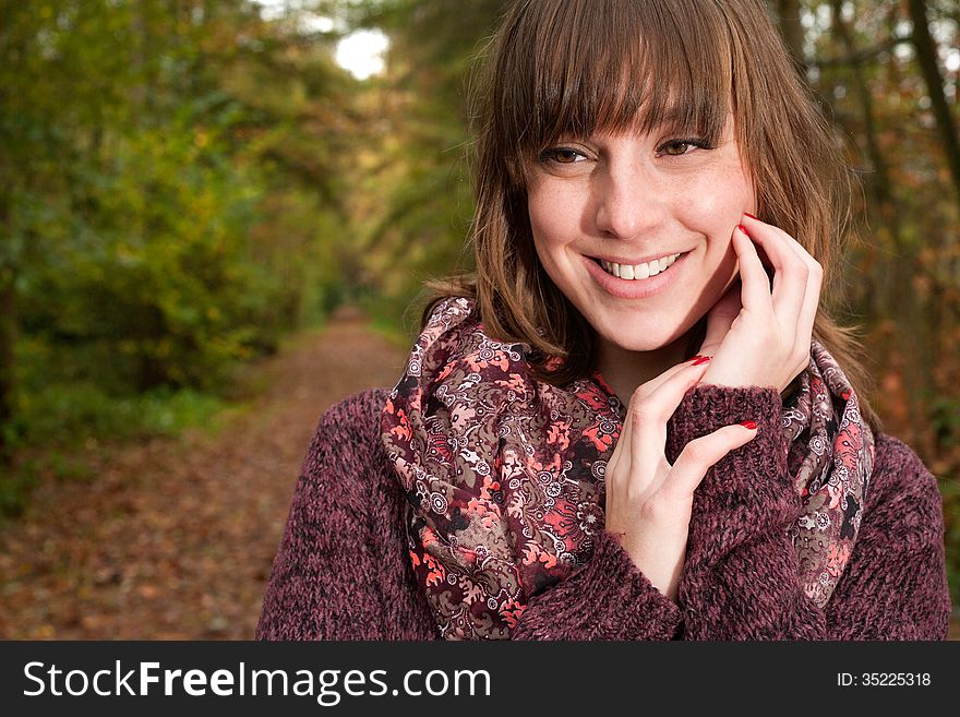 Young woman in the autumn at a cold november day. Young woman in the autumn at a cold november day