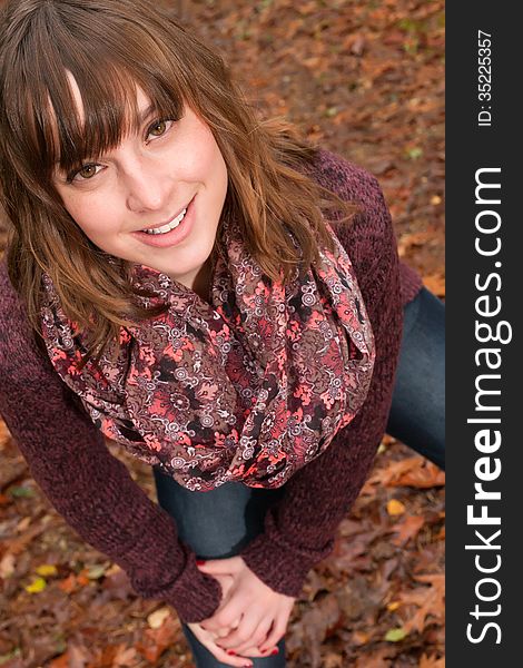 Young woman in the autumn at a cold november day. Young woman in the autumn at a cold november day