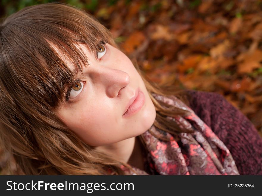 Young woman in the autumn at a cold november day. Young woman in the autumn at a cold november day