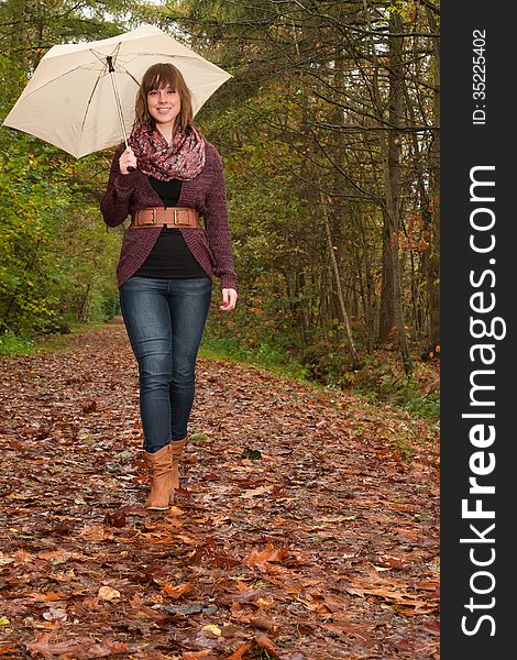 Walking In The Park With An Umbrella