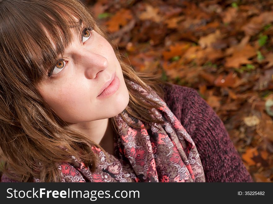 Young woman in the autumn at a cold november day. Young woman in the autumn at a cold november day