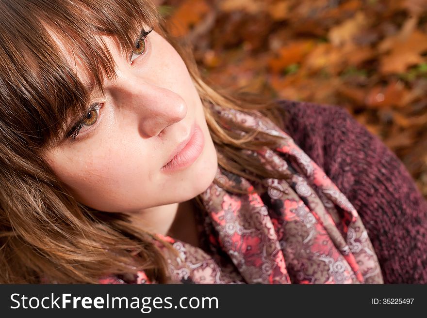 Young woman in the autumn at a cold november day. Young woman in the autumn at a cold november day