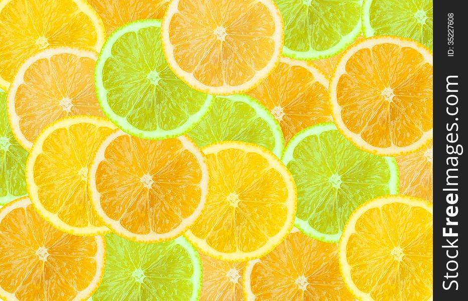 Abstract three-color background with citrus fruit of grapefruit, orange and lemon slices