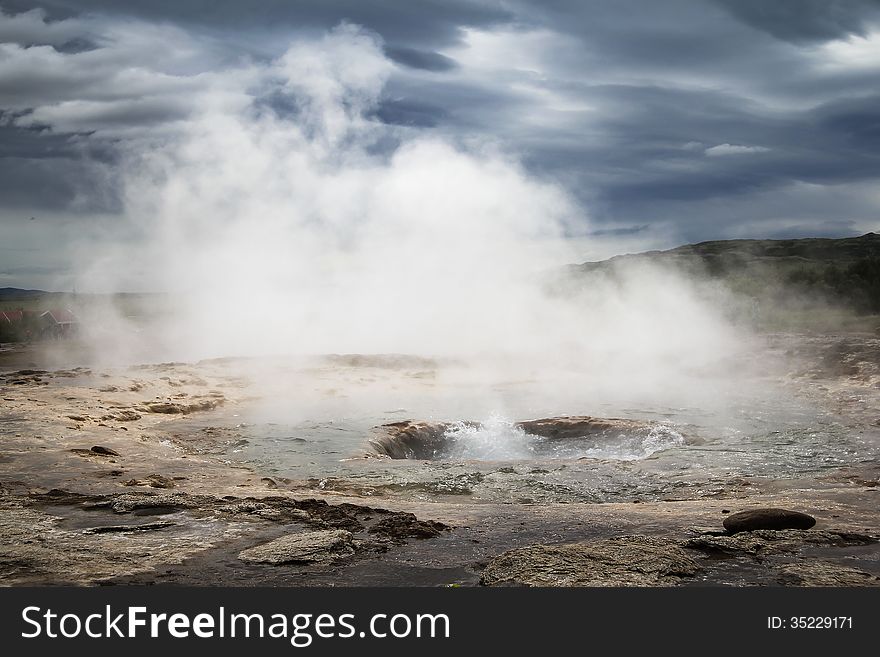 Scene at Haukadalur in Iceland, site of numerous geothermal eruptions, part of the 'Golden Circle' trail of famous sites on the island. Scene at Haukadalur in Iceland, site of numerous geothermal eruptions, part of the 'Golden Circle' trail of famous sites on the island