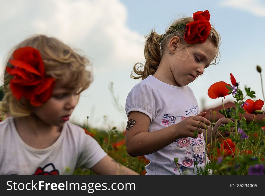 Girls with red poppy