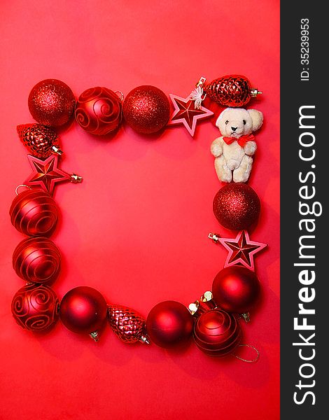 Red Cristmas decoration on red background. Red Cristmas decoration on red background.