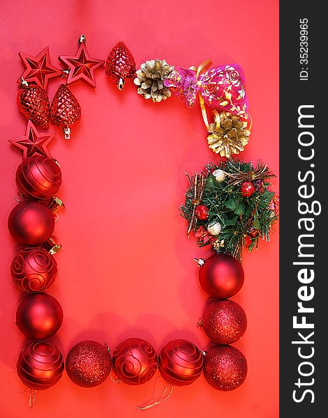 Red Cristmas decoration on red background. Red Cristmas decoration on red background.