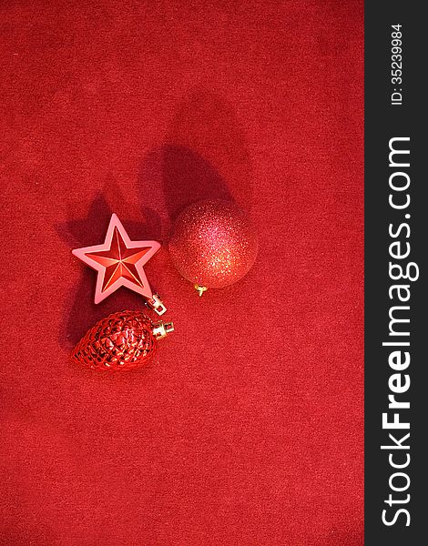 Red Cristmas decoration on red background. Red Cristmas decoration on red background.