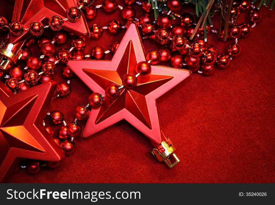 Red Cristmas star decoration on red background. Red Cristmas star decoration on red background.