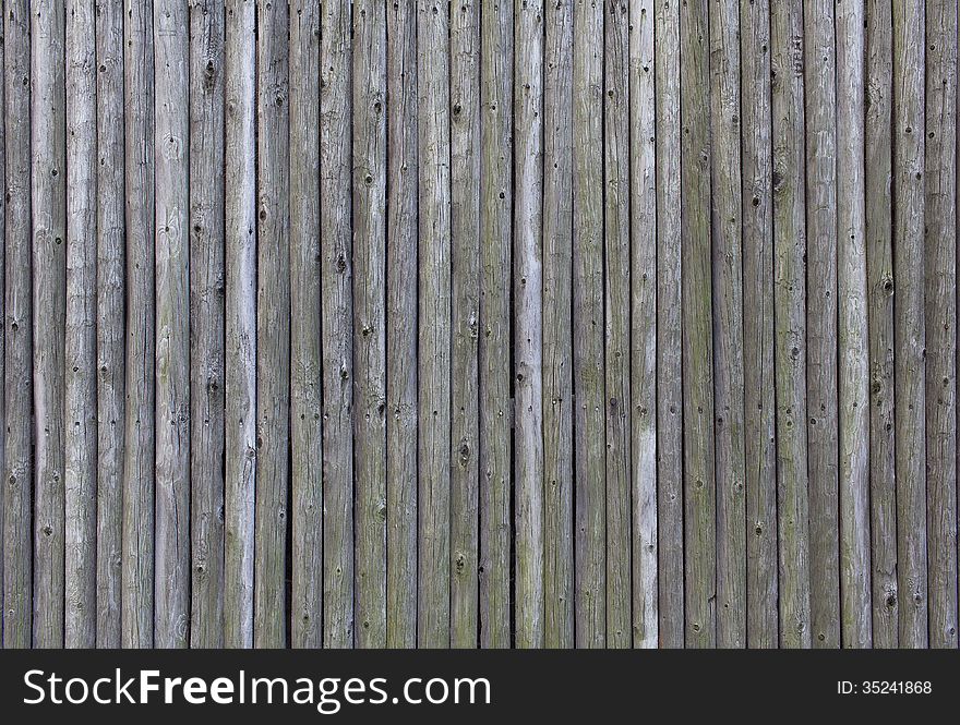 Old wooden fence, gray color. Old wooden fence, gray color