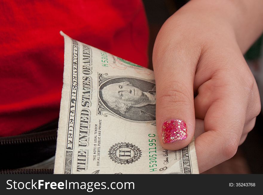 Girl Holding Currency