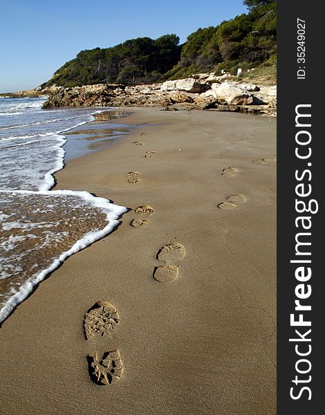 Human footprints in the beach