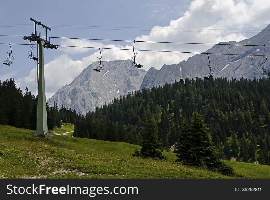 Cable way in the beautiful background off the alps