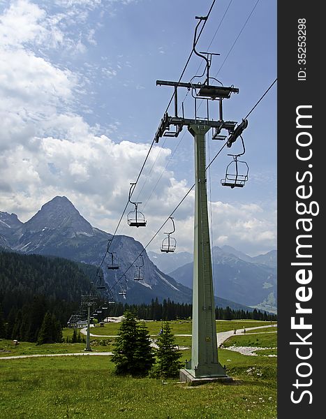 Funicular in the beautiful landscape and clouds of the Alps , Austria