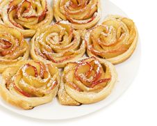 Sweet Rolls With Apples In The Form Of Roses On Plate On White B Stock Photo Sweet Rolls With Apples In The Form Of Roses On Plate On White B Stock Photo
