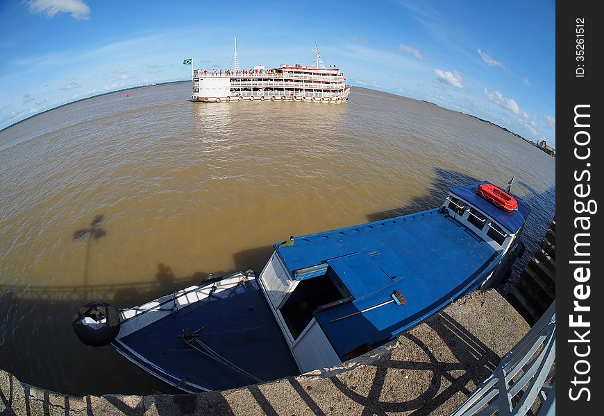 Boat in the Guajara bay, Amazon river delta, in Belem - Amazonian city - Brazil