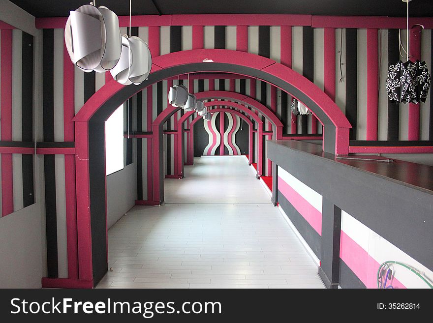 Hotel lobby design in pink with modern lamps