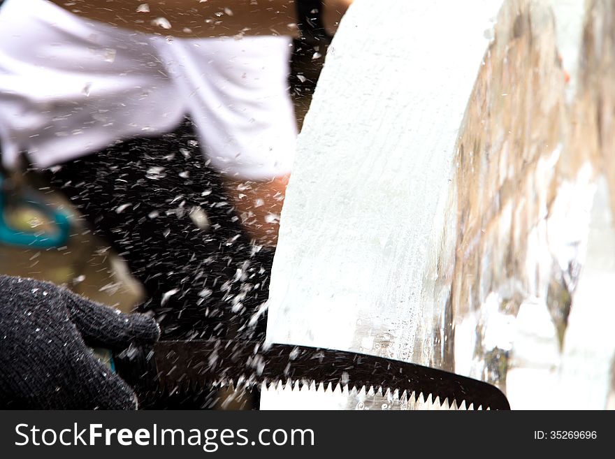 Ice Carver Using Chisel to Carve. Ice Carver Using Chisel to Carve