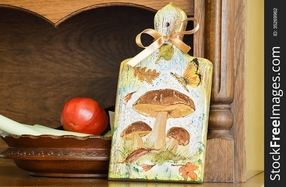 One handmade decorated wooden board with antique effect.