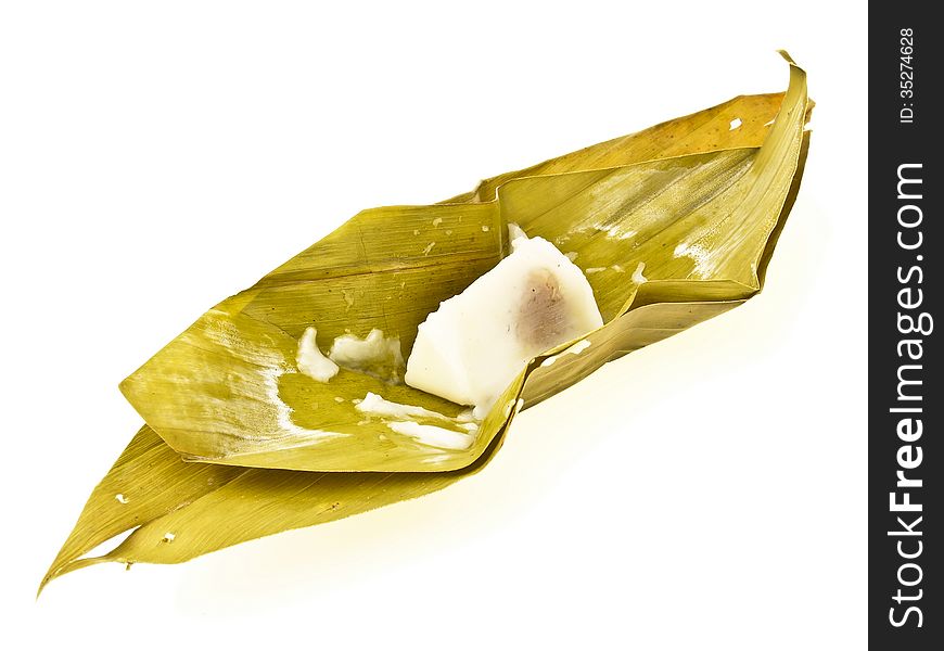 Sweet Stuffed Dough, Kind of Thai dessert, made from coconut sugar and flour, put on banana leaf on white background