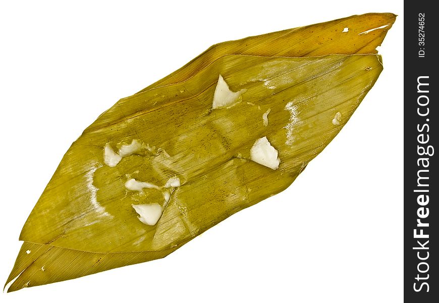 Bare banana leaf package after eating on white background. Bare banana leaf package after eating on white background