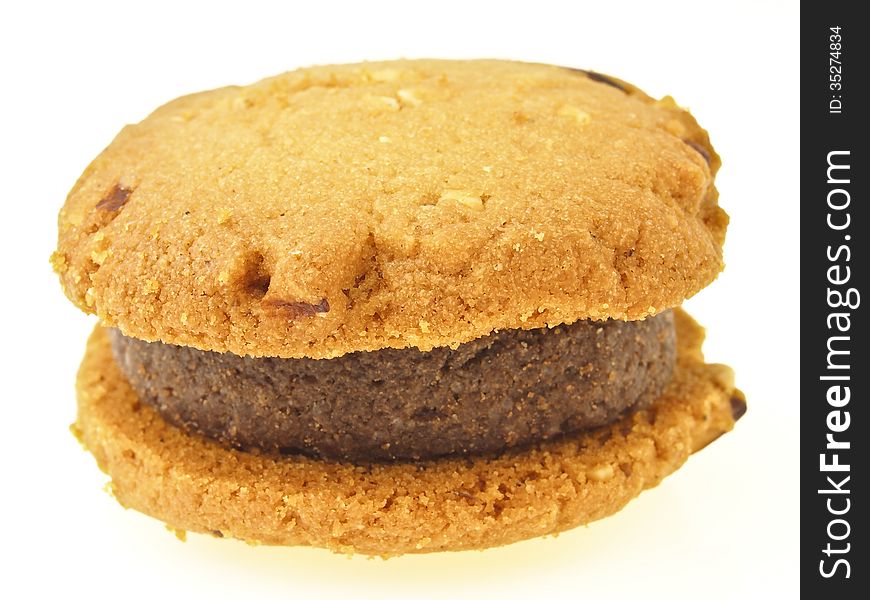 Compound of brown and yellow cookies in hamburger shape on white background. Compound of brown and yellow cookies in hamburger shape on white background