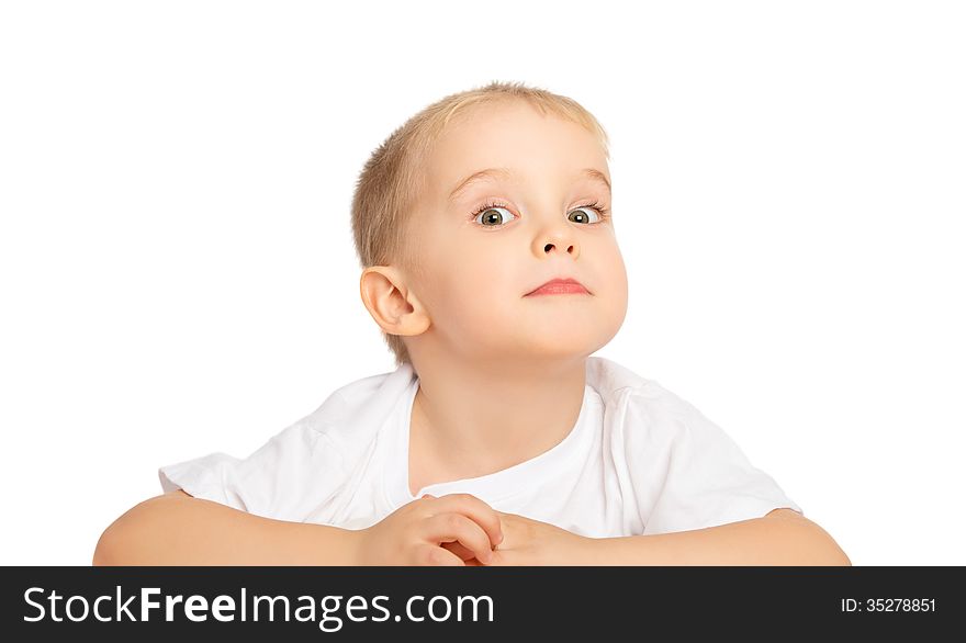 Happy child little boy in the bed