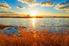 The Setting Sun Lake Pumping Unit Royalty Free Stock Photo The Setting Sun Lake Pumping Unit Royalty Free Stock Photo