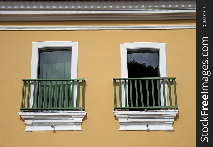 Ocher picturesque wall with two windows - Amazonia - Brazil