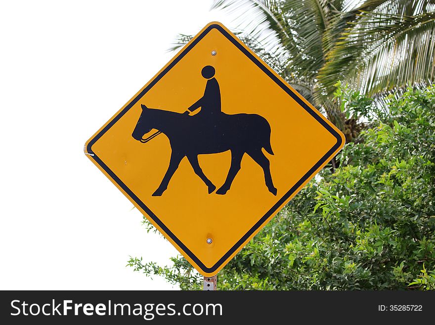 Warning road sign - Horse crossing