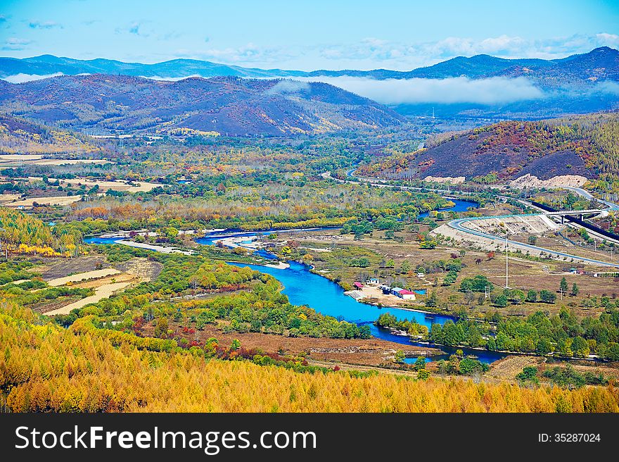 The Blue River And  Hills