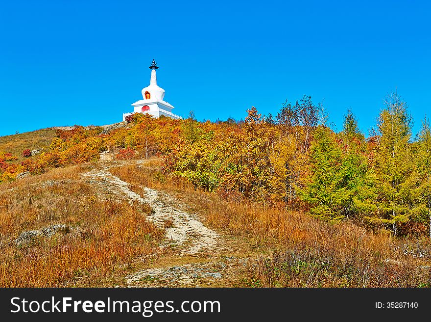 The white tower and autumn woods