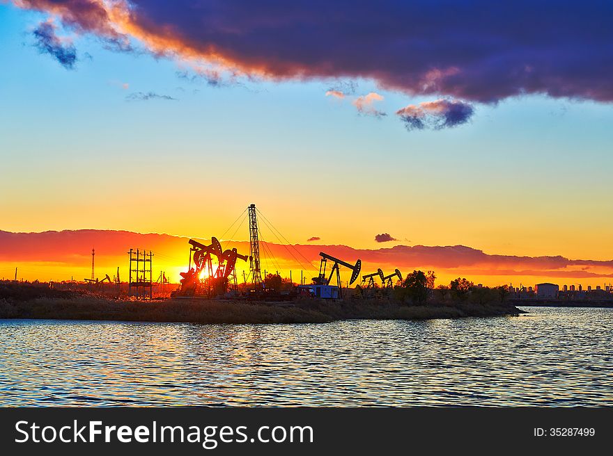 The Oil Fields And Lake Sun Setting