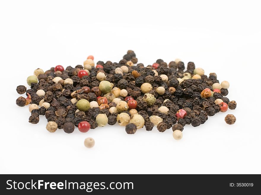 Whole Peppercorns isolated on a white background
