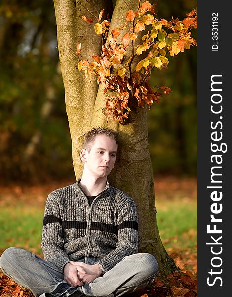 Boy outside in autumn colors