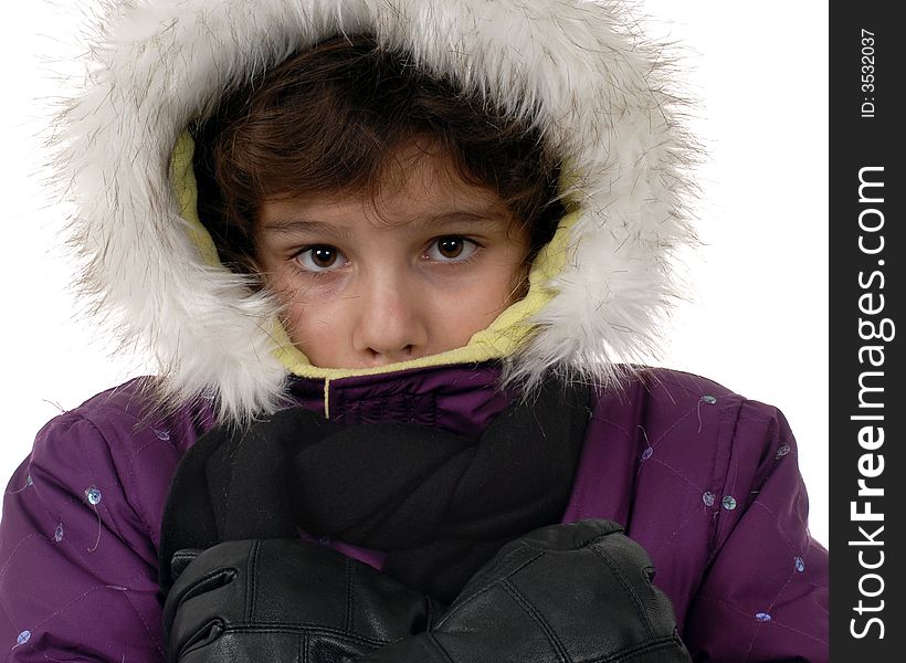 Preteen girl shivering in her outdoor winterwear. Preteen girl shivering in her outdoor winterwear.