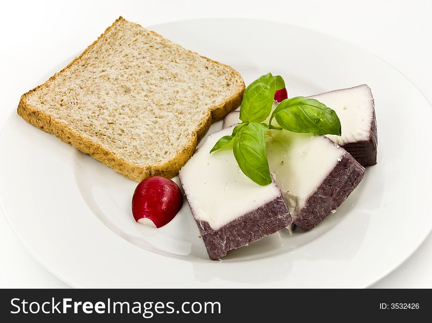 Gourmet cheese with toast and radish.