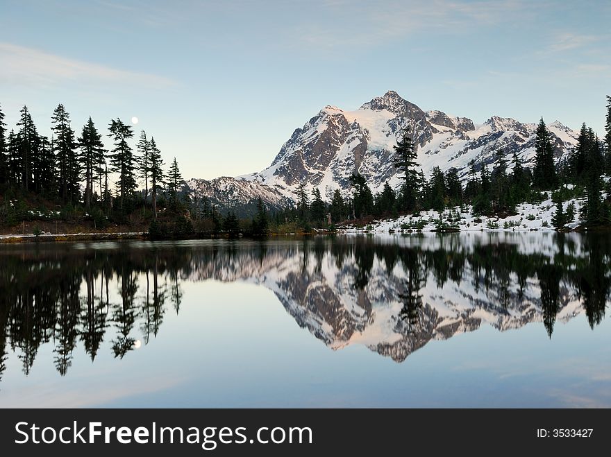 Picture Lake reflection of Mount Shuksan with snow. Picture Lake reflection of Mount Shuksan with snow