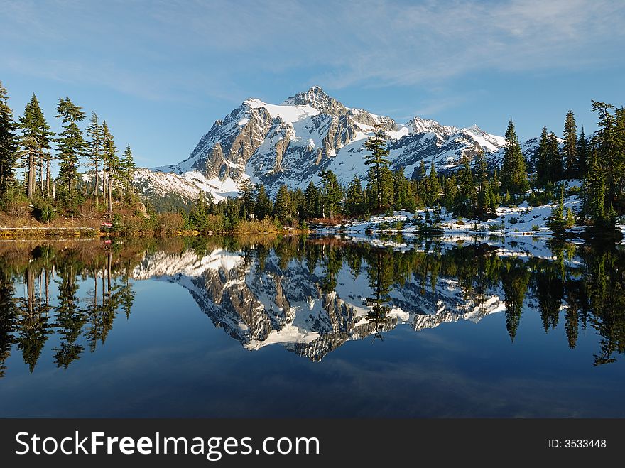 Picture Lake reflection of Mount Shuksan with snow. Picture Lake reflection of Mount Shuksan with snow