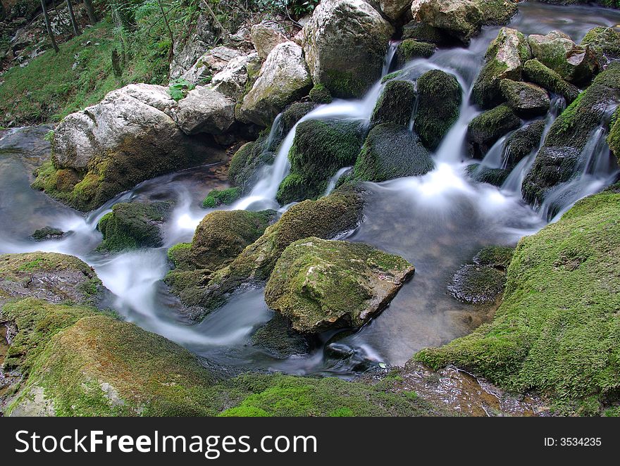 Small waterfalls on mountain river. Small waterfalls on mountain river.