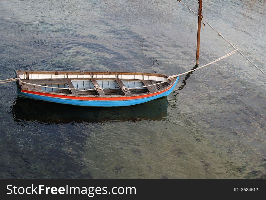 Wood lifeboat on a beach