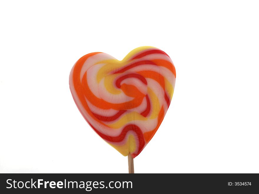 Heart shaped lollypop isolated on white. Heart shaped lollypop isolated on white.