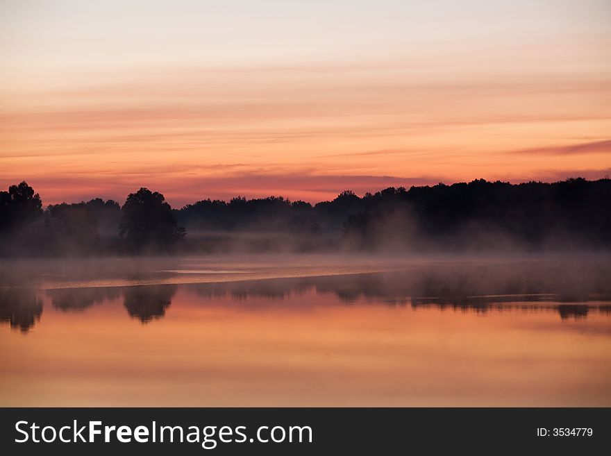 Morning red sunshine on the lake