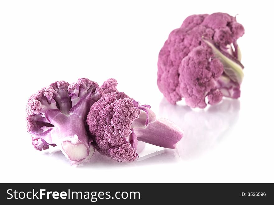 Purple cauliflower isolated on white background. Purple cauliflower isolated on white background.