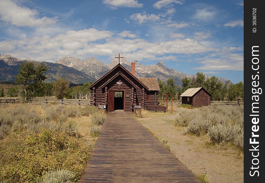 The picture of the Chapel of Transfiguration and Teton Range.