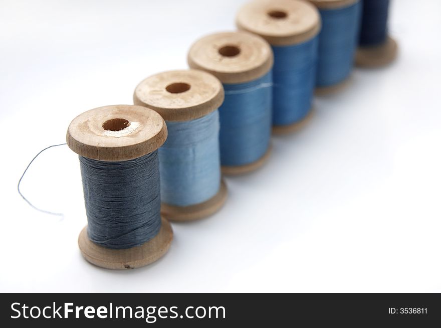 A blue colours range of blue and grey threads. A blue colours range of blue and grey threads