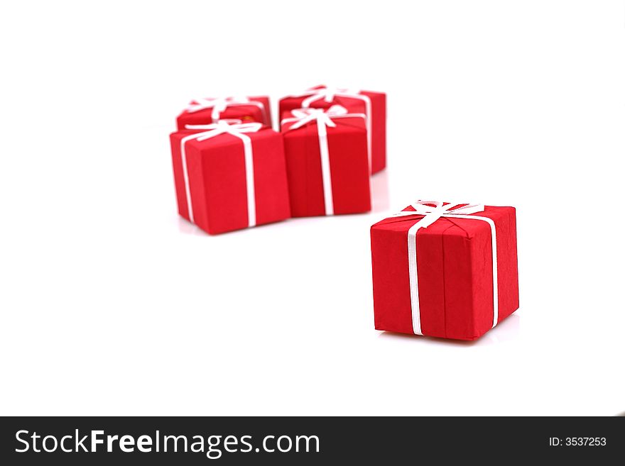 Packages of christmas gifts on white background