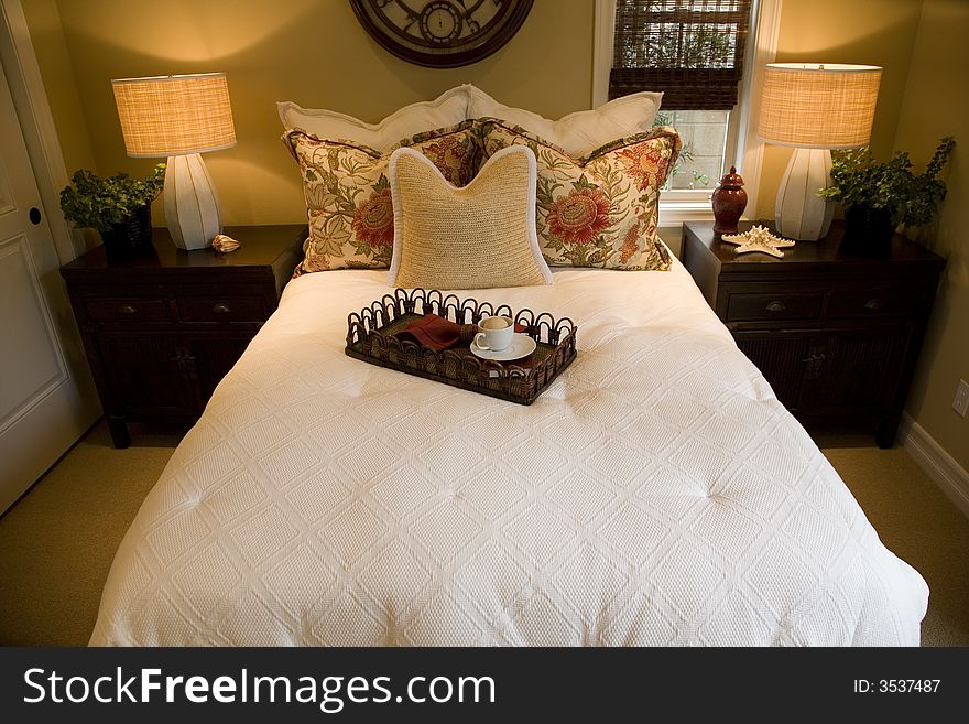 Luxury home bedroom with bed tray. Luxury home bedroom with bed tray.