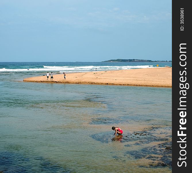 Girl playing at the beach, Sydney, Australia. Girl playing at the beach, Sydney, Australia